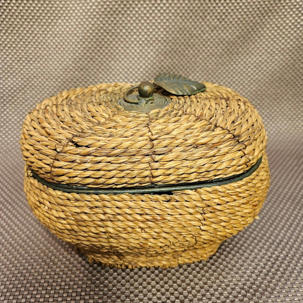 Vintage hand-woven coiled rye straw rattan wicker basket with metal leaf topper